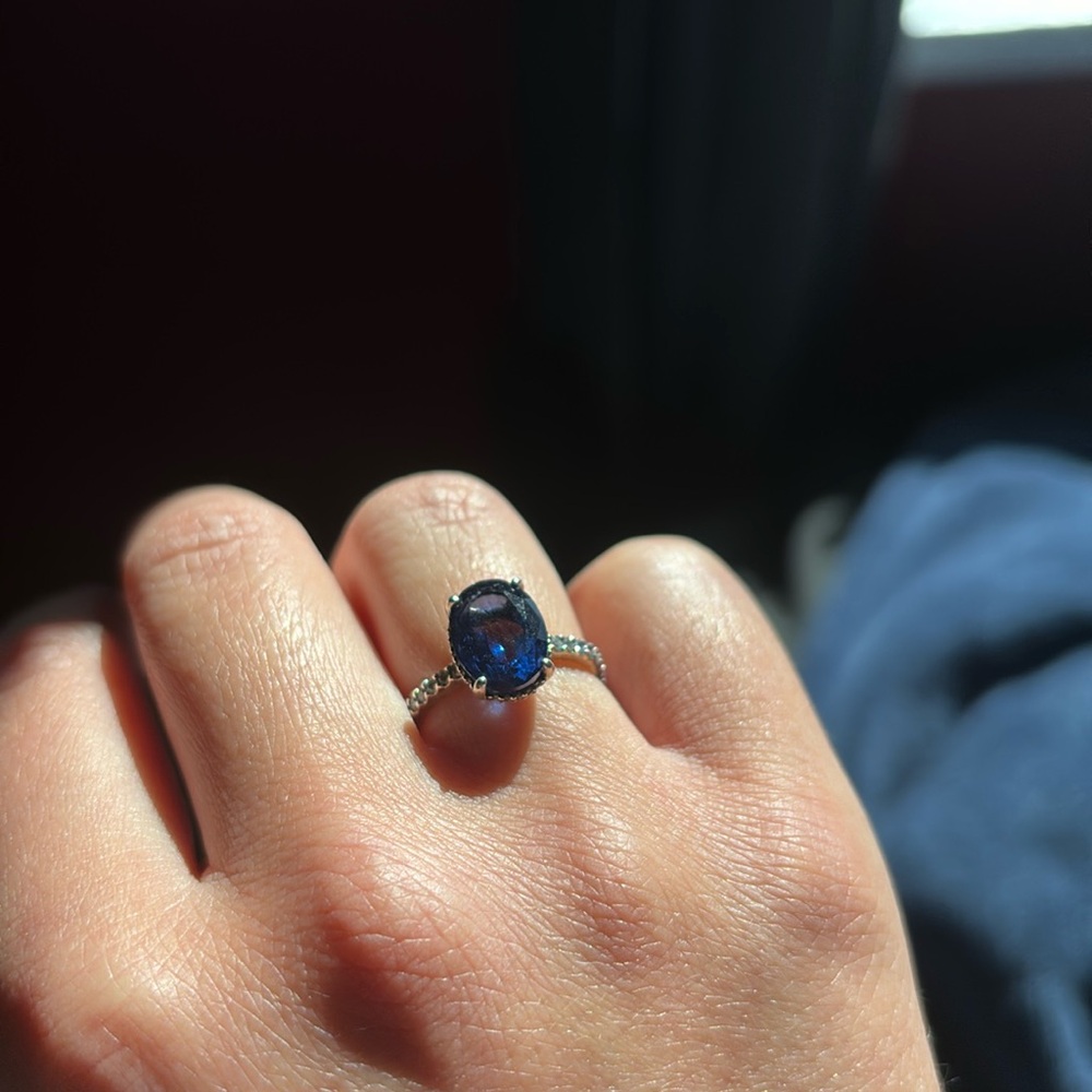 Lab created sapphire Pandora ring with CZs. In pristine condition hardly worn.